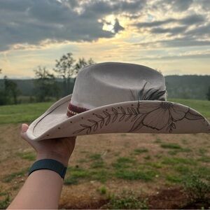 Elegant Floral Cream Hat with Feather Accent